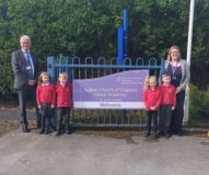 Executive Headteacher Mrs Natalie Butcher with St Benet's CEO Richard Cranmer and pupils from Sutton CofE Infant Academy