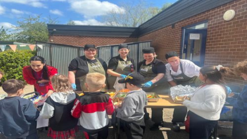 Sancroft catering staff serving pupils
