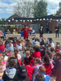 Harleston Town Crier, Norman Steer, with pupils of Harleston Sancroft Academy Primary Phase